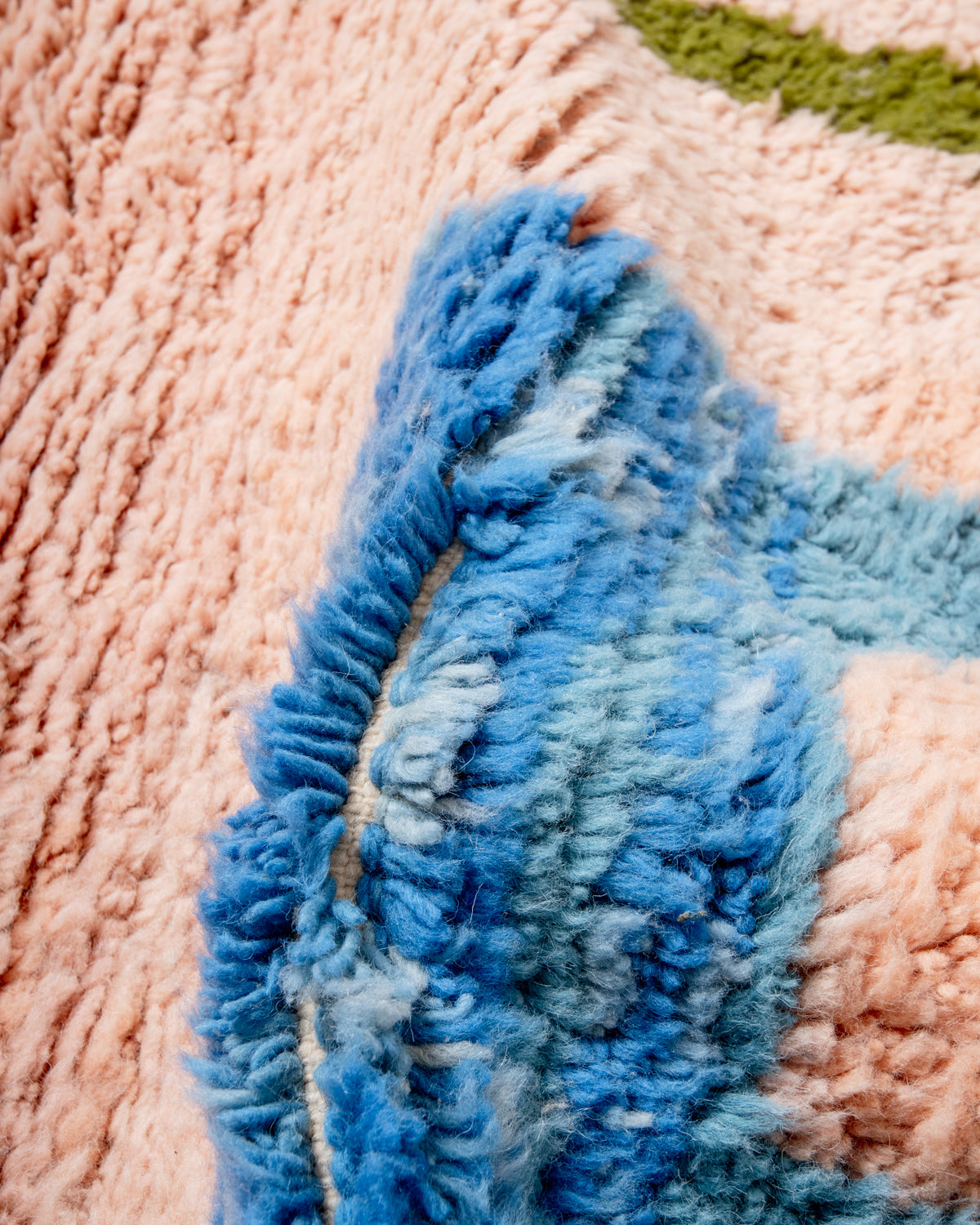 Modern, designer, handcrafted Berber rug from Morocco. Beniourain carpet with beautiful colours and patterns and fluffy wool texture.